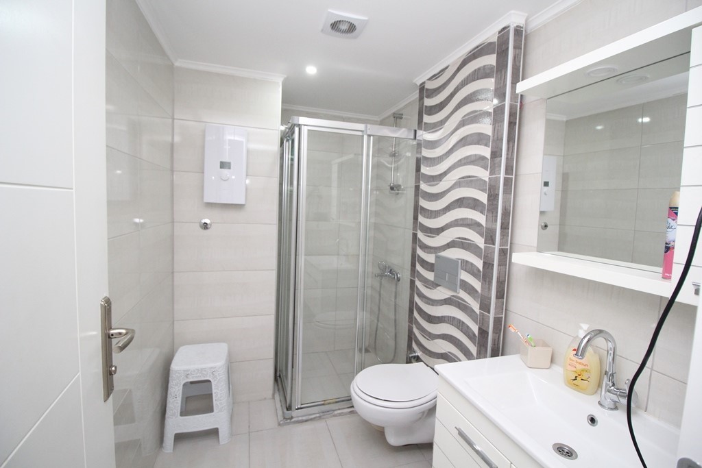 2+1 Apartment in the center of Alanya with rooftop relaxation area - Umbrella Group - Photo 9