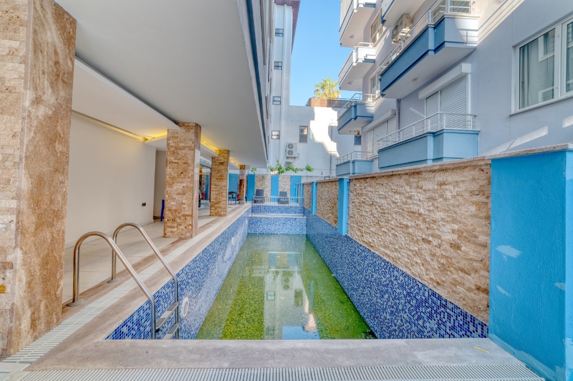 2+1 Apartment in the center of Alanya with rooftop relaxation area - Umbrella Group - Photo 19