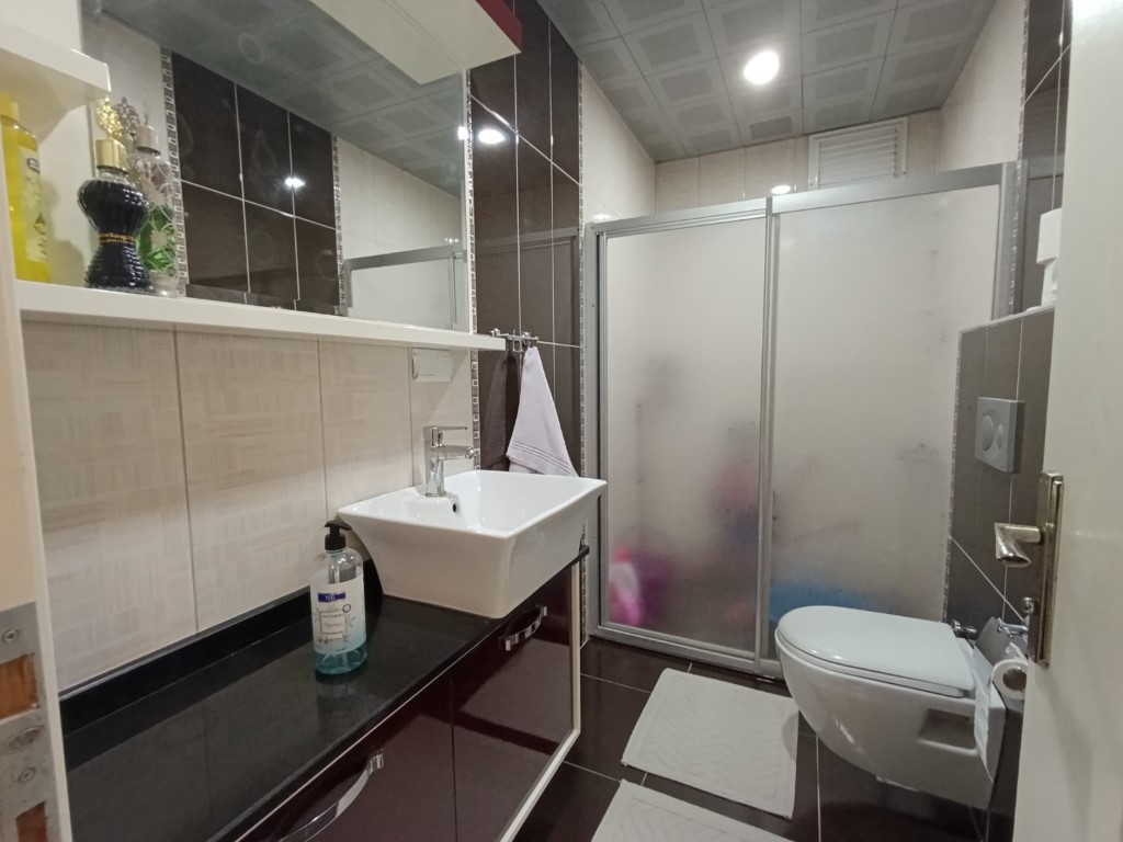 Two-bedroom apartment in the center of Alanya with the possibility of obtaining a residence permit - Umbrella Group - Photo 13