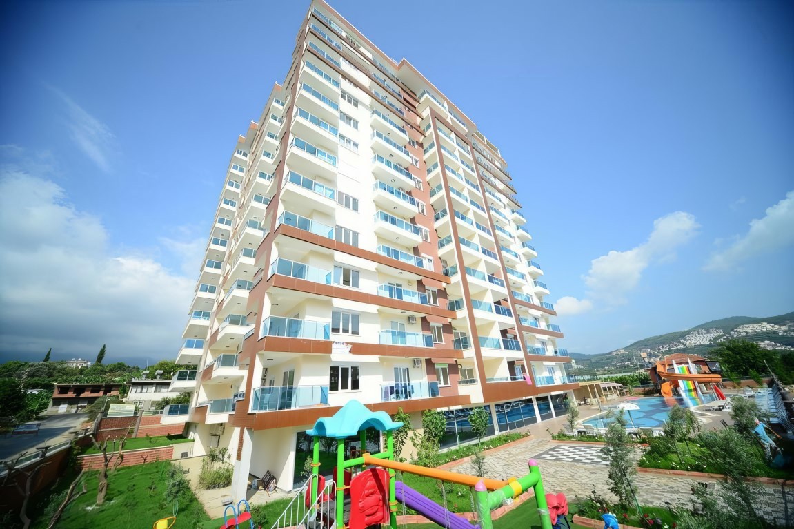 Furnished one bedroom apartment 70 m2 in the district of Mahmutlar - Umbrella Group - Photo 22