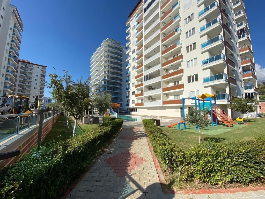 Furnished one bedroom apartment 70 m2 in the district of Mahmutlar - Umbrella Group - Photo 23