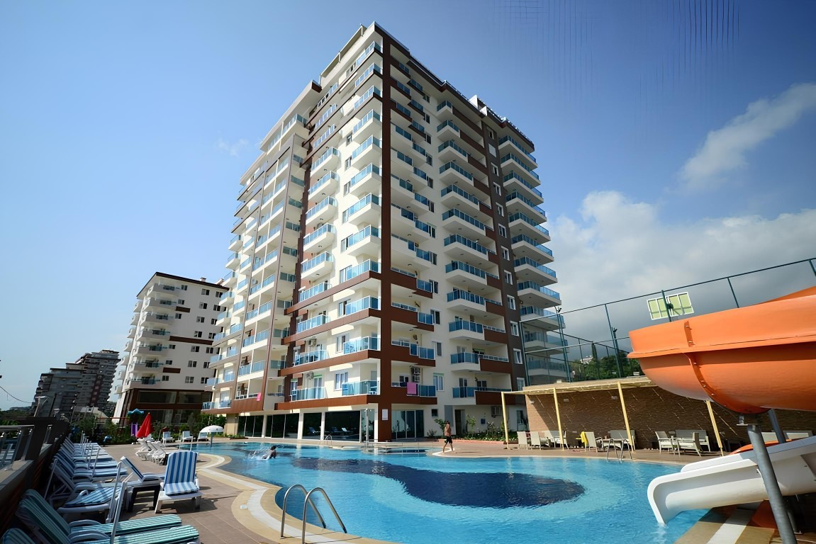 Furnished one bedroom apartment 70 m2 in the district of Mahmutlar - Umbrella Group - Photo 20