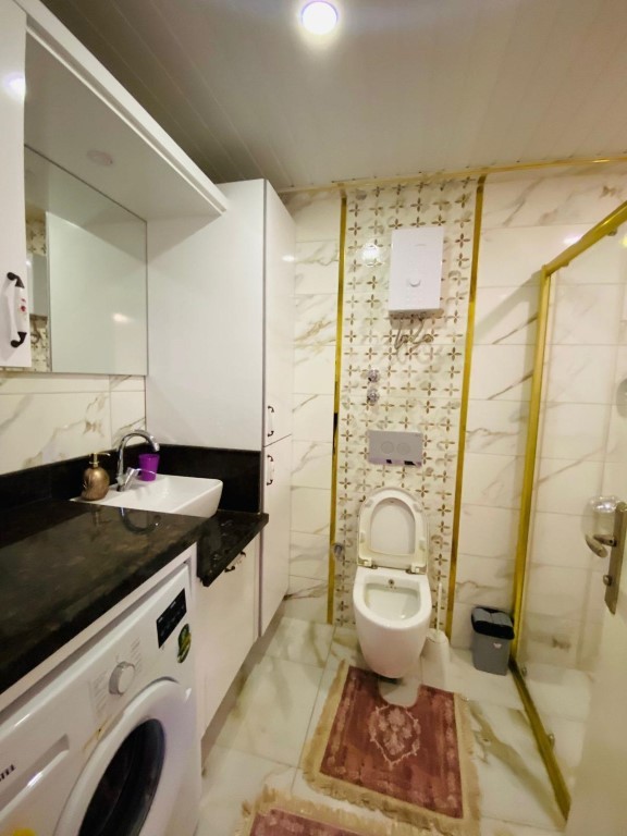 Three-room apartment of 115 m2, 200 m from the sea (Mahmutlar) - Umbrella Group - Photo 10