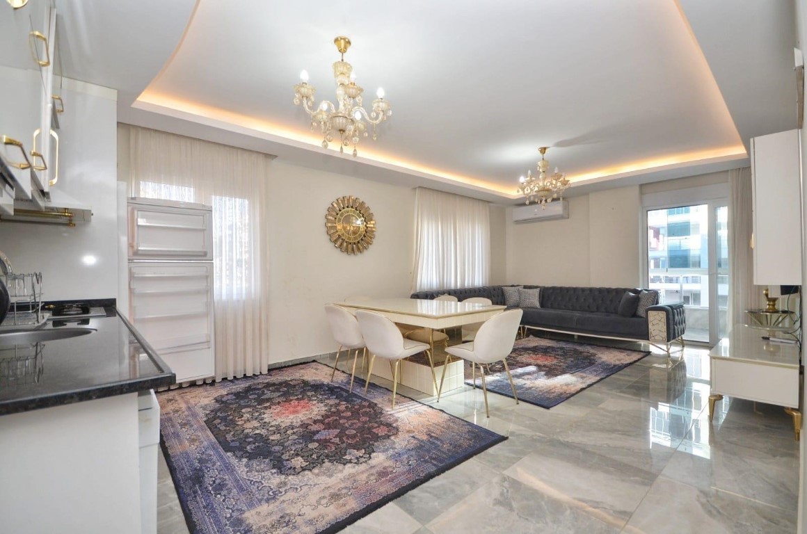 Three-room apartment of 115 m2, 200 m from the sea (Mahmutlar) - Umbrella Group