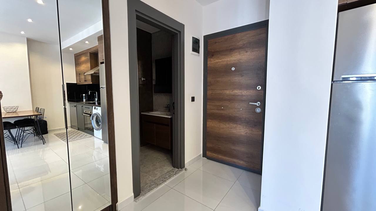 Two-room apartment of 55 m2 in complex with hotel infrastructure, Mahmutlar - Umbrella Group - Photo 8