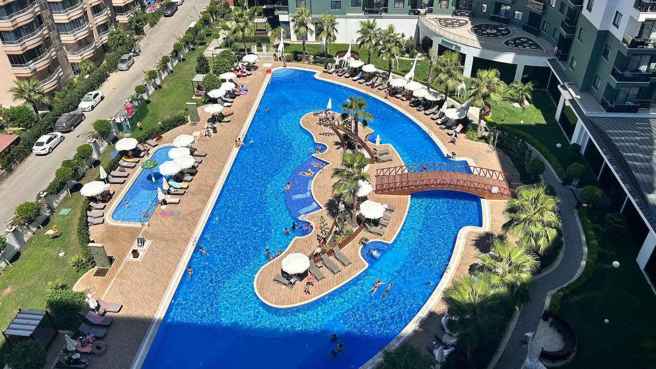 Two-room apartment of 55 m2 in complex with hotel infrastructure, Mahmutlar - Umbrella Group - Photo 22