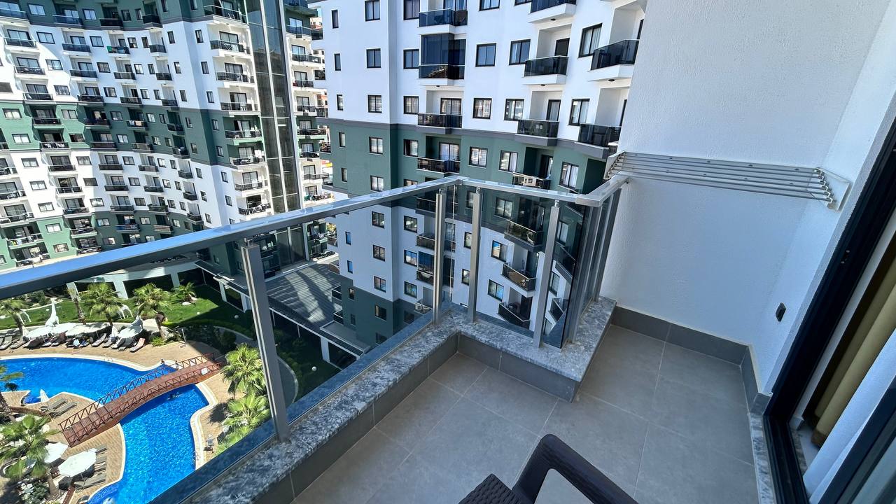 Two-room apartment of 55 m2 in complex with hotel infrastructure, Mahmutlar - Umbrella Group - Photo 20