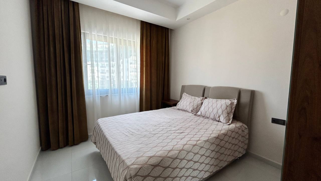 Two-room apartment of 55 m2 in complex with hotel infrastructure, Mahmutlar - Umbrella Group - Photo 17