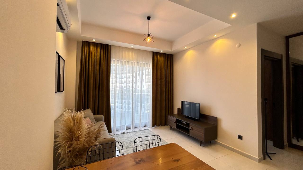 Two-room apartment of 55 m2 in complex with hotel infrastructure, Mahmutlar - Umbrella Group - Photo 14