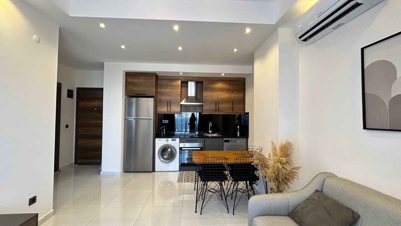 Two-room apartment of 55 m2 in complex with hotel infrastructure, Mahmutlar - Umbrella Group - Photo 13