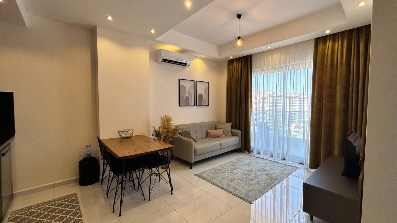 Two-room apartment of 55 m2 in complex with hotel infrastructure, Mahmutlar - Umbrella Group - Photo 11