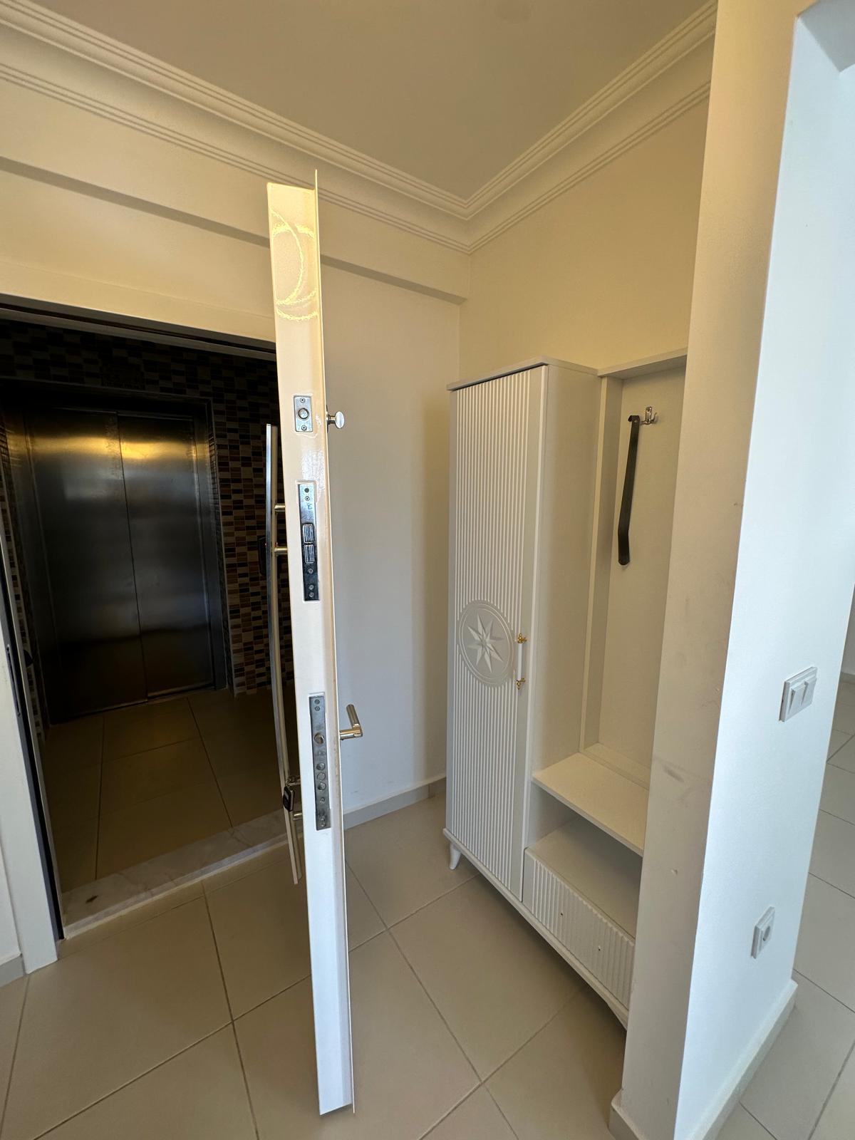 Two-room apartment on the 5th floor in Mahmutlar district - Umbrella Group - Photo 12