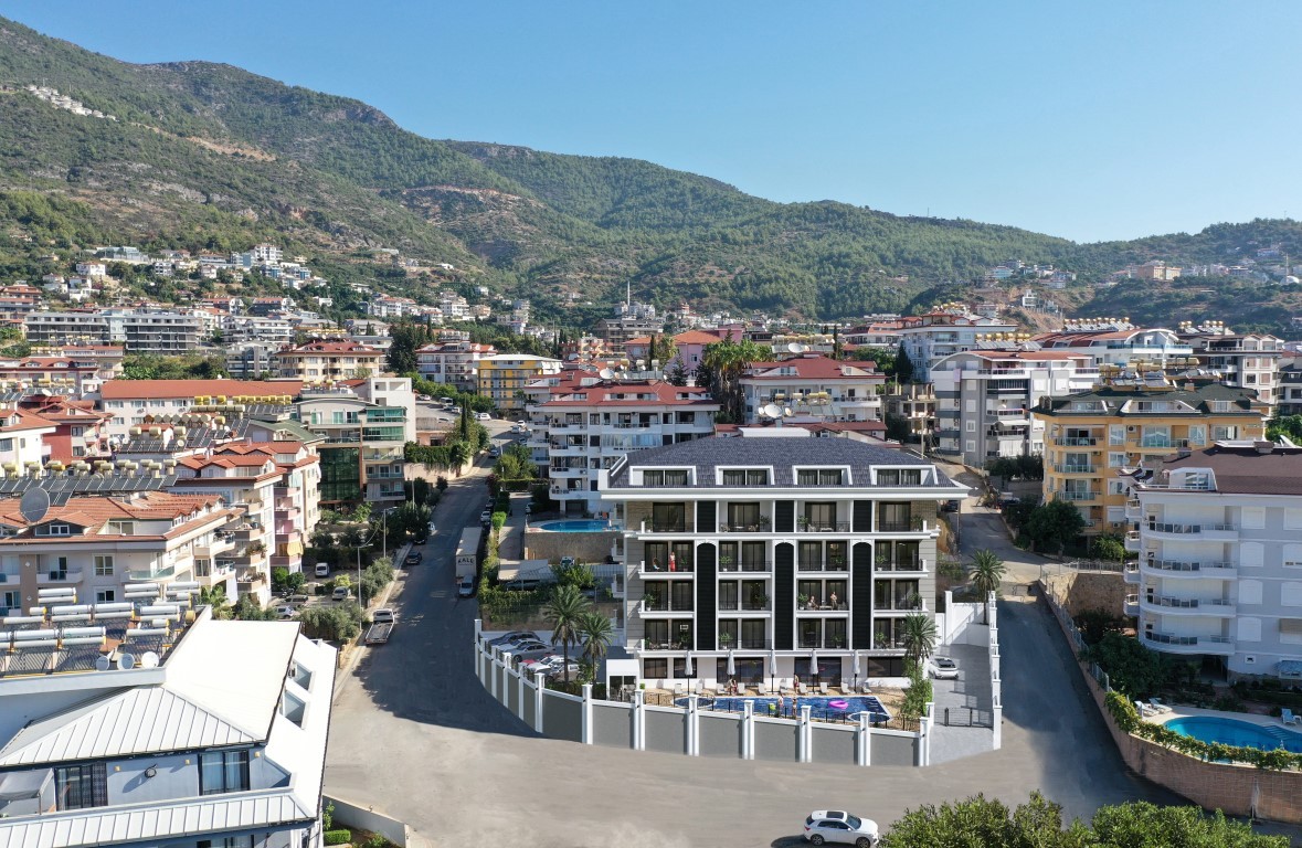 New project in the heart of Alanya, with apartments of 1+1, 2+1 and 3+1 - Umbrella Group - Photo 4