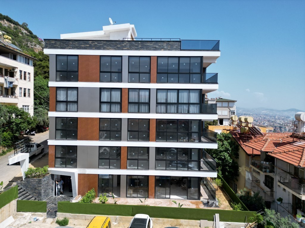 Residential complex in the very center of Alanya, with apartments planning 2+1 and 3+1 - Umbrella Group - Photo 4