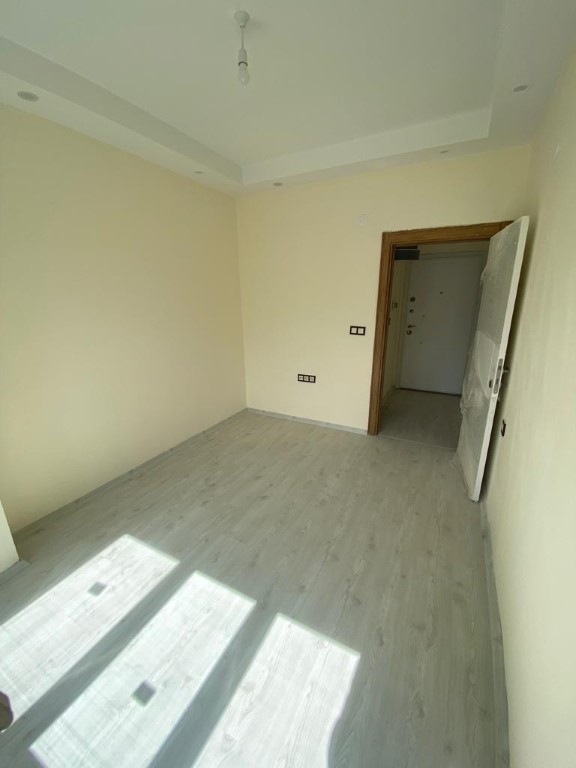 Two-room apartment on the 4th floor in Mahmutlar district - Umbrella Group - Photo 11