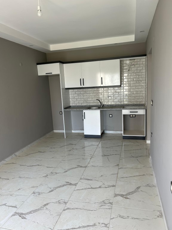 Bright apartment with 1+1 floor in Mahmutlar - Umbrella Group - Photo 7