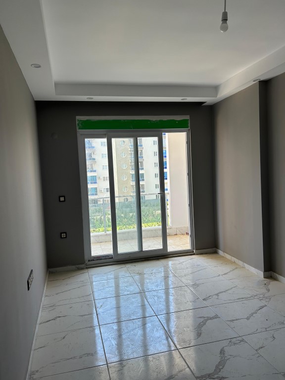 Bright apartment with 1+1 floor in Mahmutlar - Umbrella Group - Photo 8