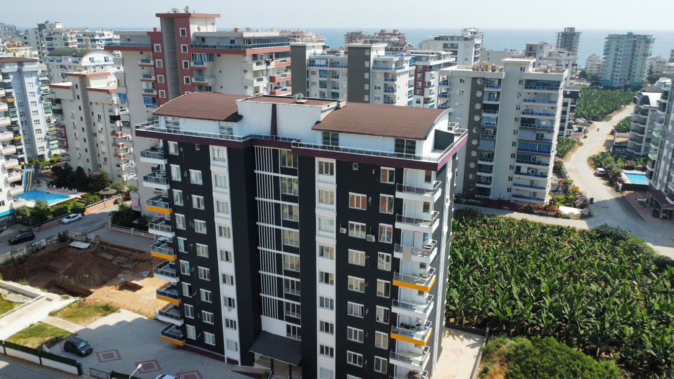 Two-room apartment on the 4th floor in Mahmutlar district - Umbrella Group - Photo 3