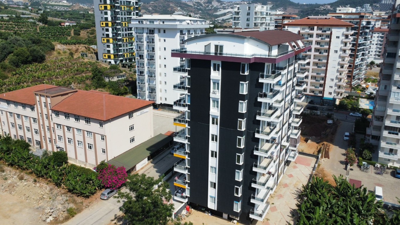 Two-room apartment on the 4th floor in Mahmutlar district - Umbrella Group - Photo 4