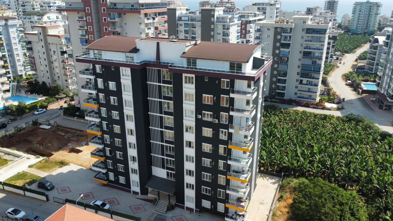 Two-room apartment on the 4th floor in Mahmutlar district - Umbrella Group - Photo 2