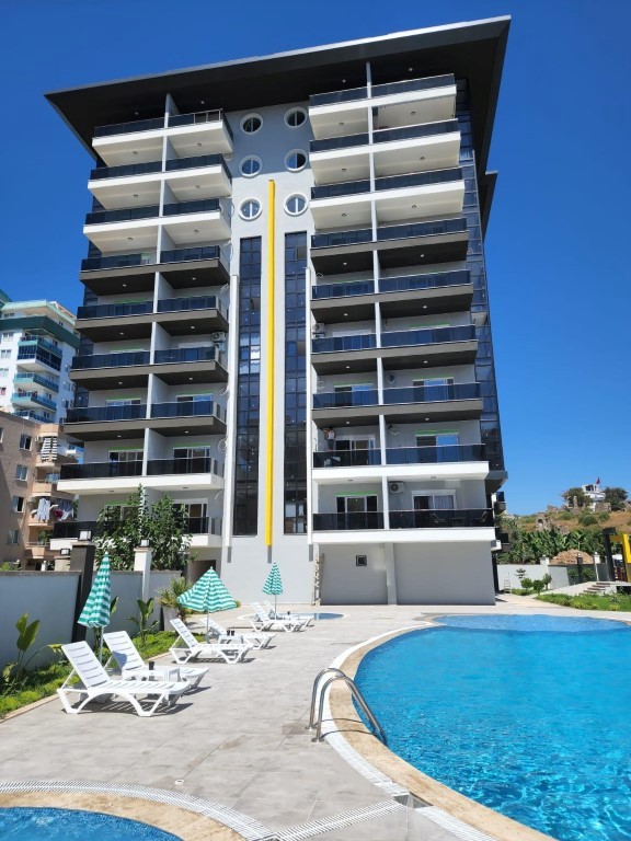 2+1 apartments of 90 m2 in the popular area of Mahmutlar. - Umbrella Group - Photo 24