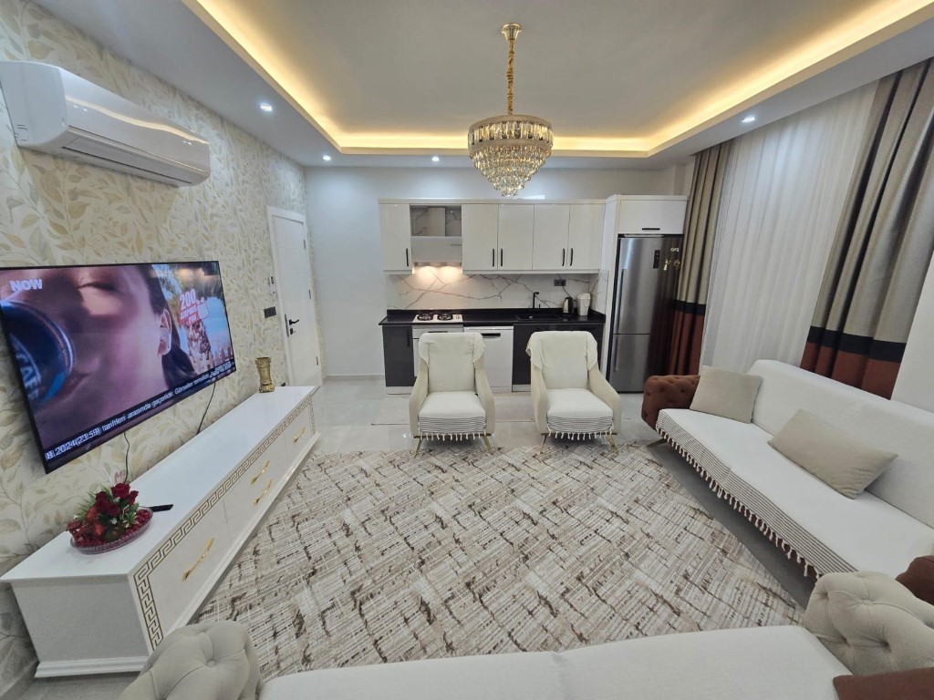 2+1 apartments of 90 m2 in the popular area of Mahmutlar. - Umbrella Group - Photo 2