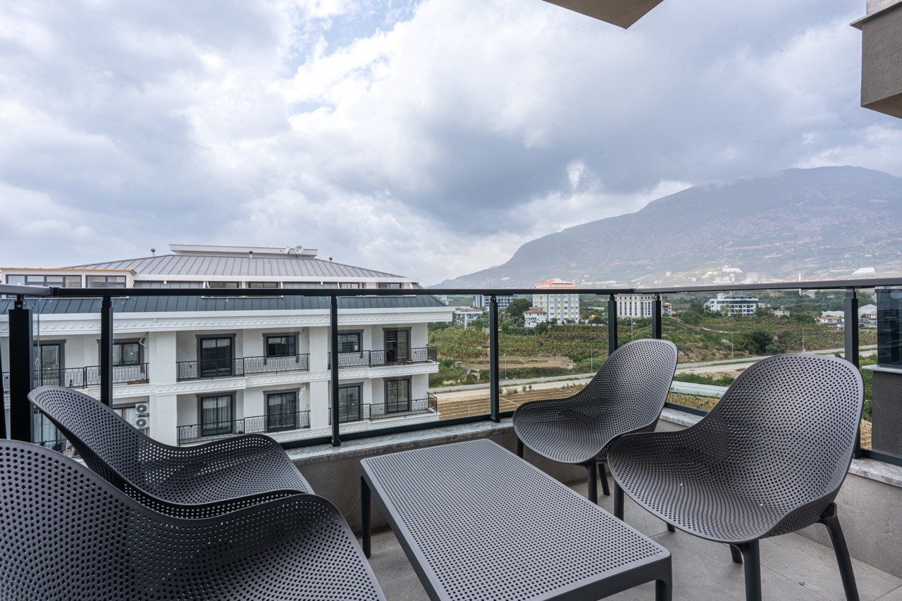 Furnished 1+1 apartment in Mahmutlar with mountain and city views, 600 meters from the sea - Photo 32