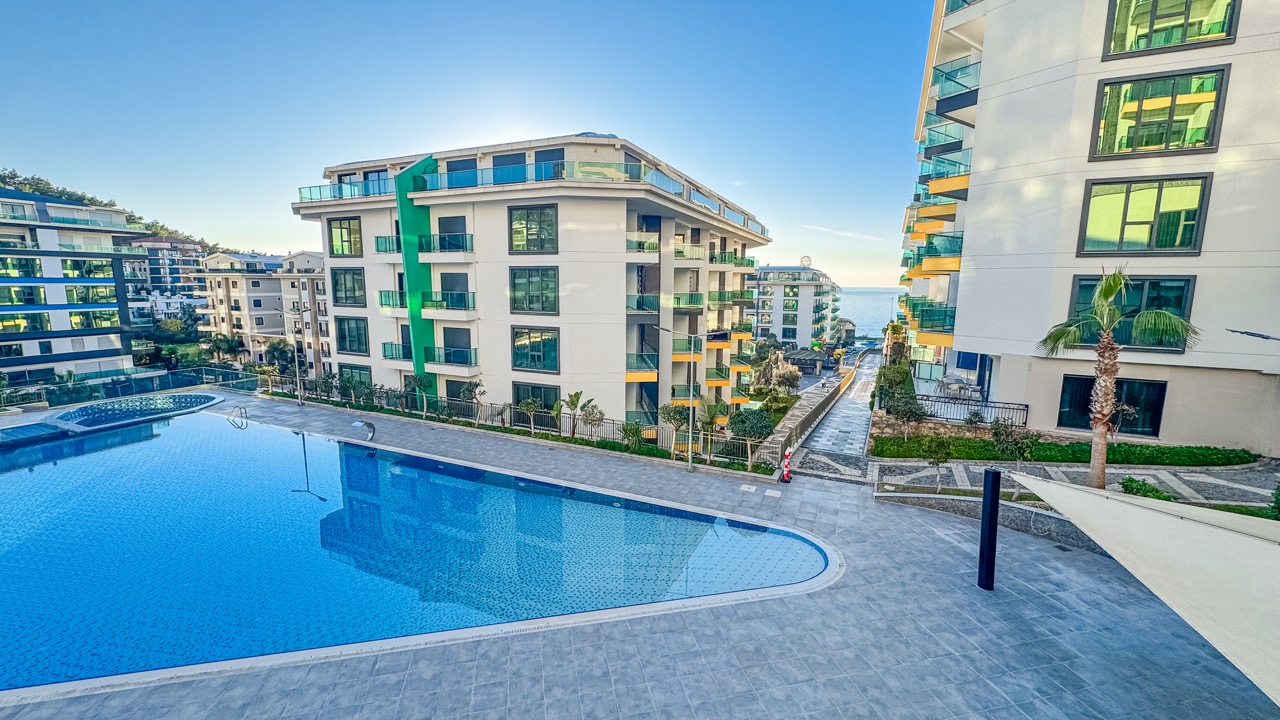 1+1 Apartment in a First-Line Complex with a Private Beach - Photo 14